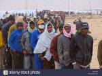 refugees-in-the-shousha-refugee-camp-waiting-for-food-distribution-C1D1XR